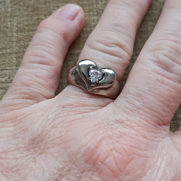 Silver Ring with a Heart Design Featuring a Sparkling Rhinestone Centerpiece. - Picture 2 of 10